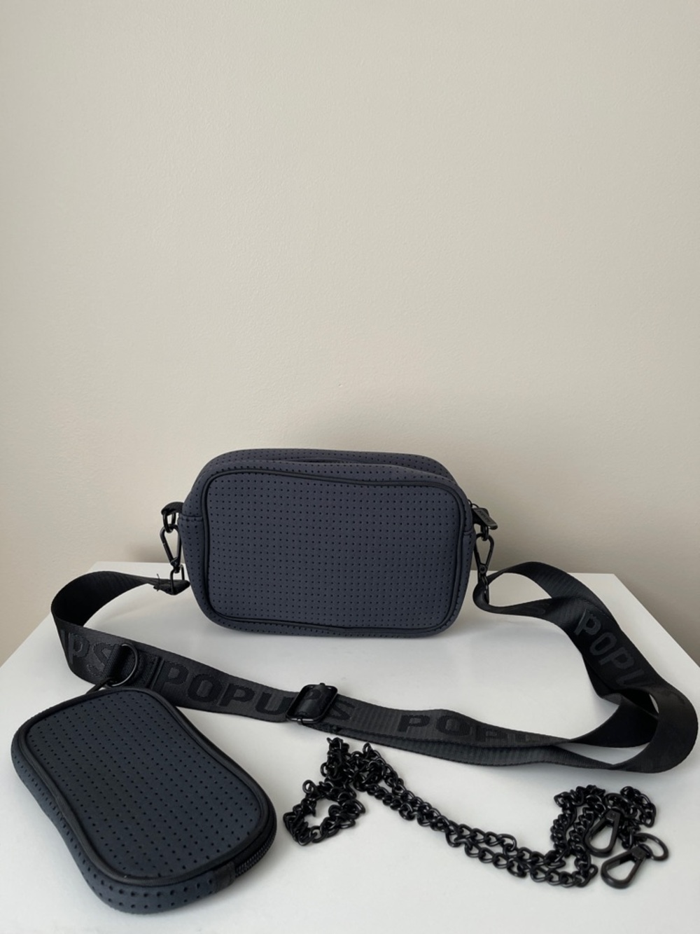NWOT...Perforated Neoprene Crossbody Bag in Charcoal with Detachable Strap